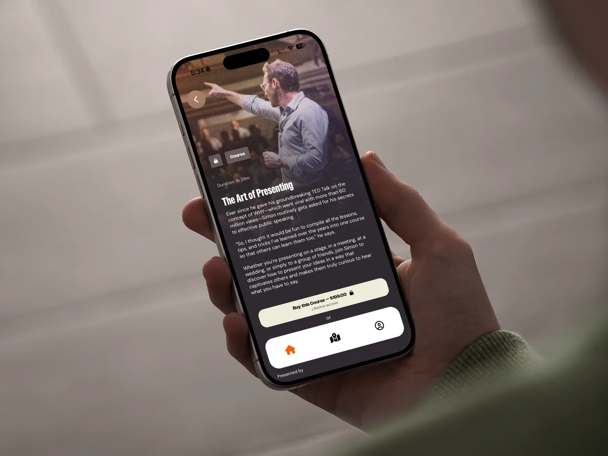 Hand holding a phone showing a course in the Leaderful app