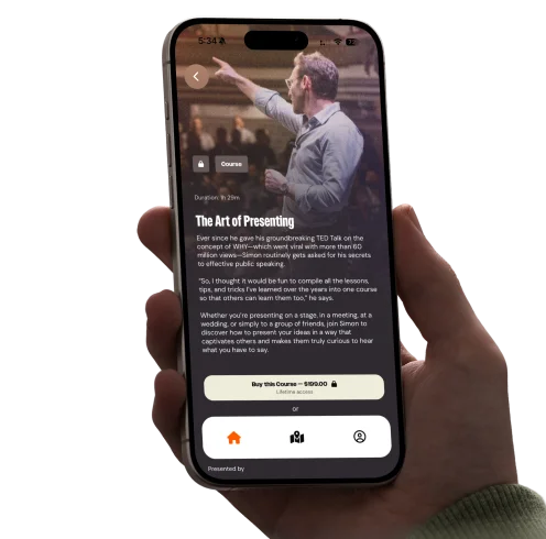 A hand holding an iPhone showing the Leaderful app's video player