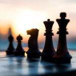 Chess pieces on display on a chess board