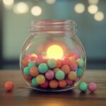 Jar with lots of toy balls inside but one is glowing