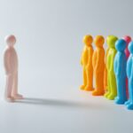 Toy figures, the one to the left is a leader, the rest the team